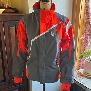 Boy’s Spider gray, orange & white ski jacket. Size 14.